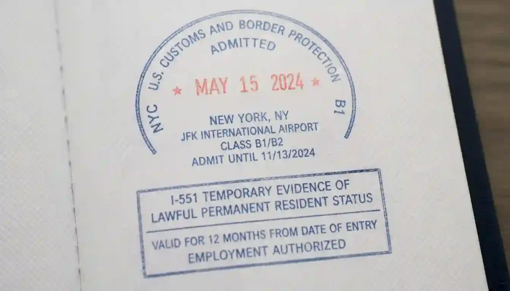 U.S. immigration passport entry stamp and visa endorsement at border checkpoint
